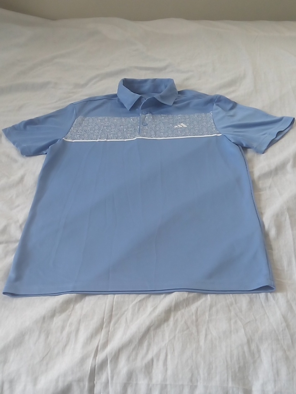 Adidas Light Blue Men’s Polo Shirt with Subtle Chest Pattern